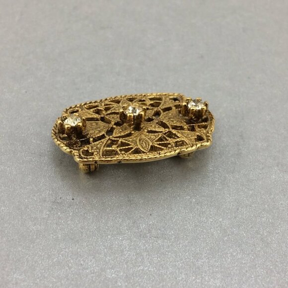 Vintage Antiqued Goldtone Metal Filigree Open Work Clear Rhinestone Brooch Pin - Picture 3 of 9
